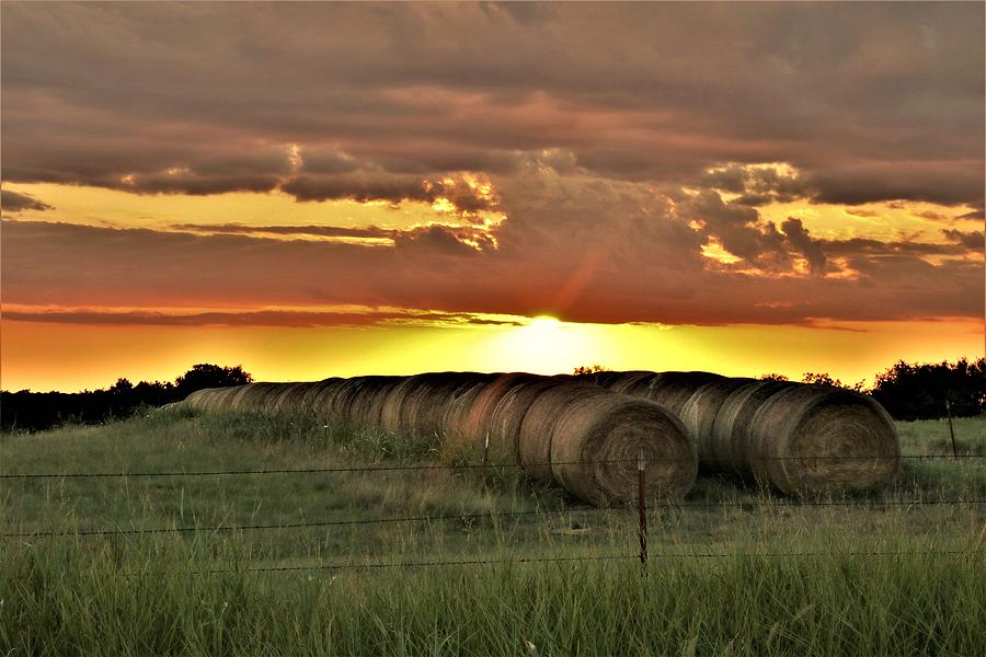 Oklahoma Sunset Over Hay Bales Photograph by Sheila Brown