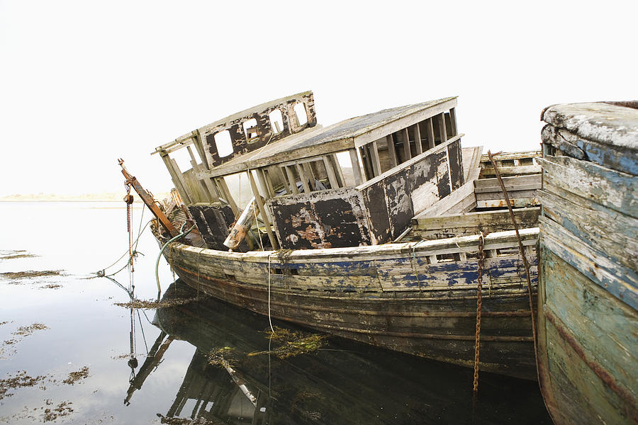Old abandoned boat Photograph by Macduff Everton
