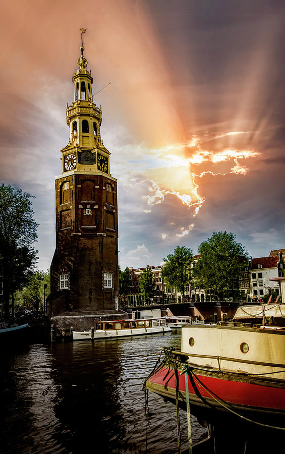 Old Amsterdam Clock Tower and Wood Boats Photograph by Norma Brandsberg
