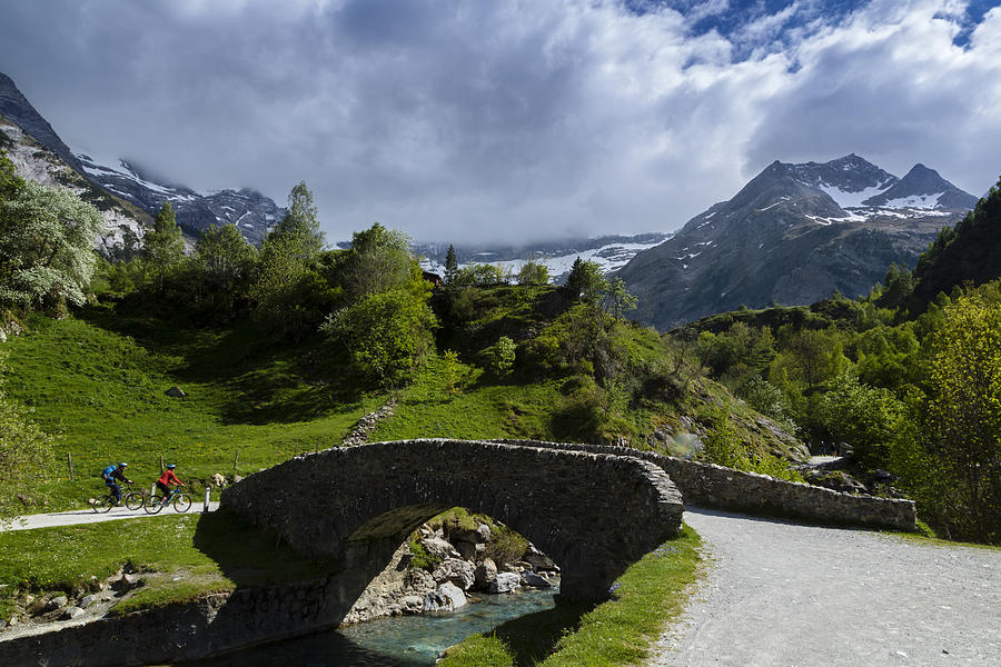 Old Bridge Over the Gave River, The Cirque Of Gavarnie,Hautes Pyrenees, France Photograph by Yann Guichaoua-Photos