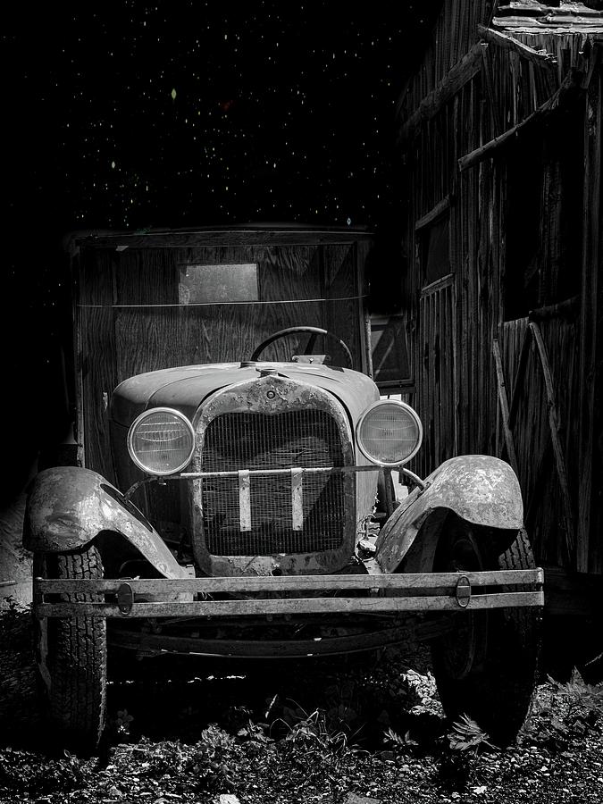 Old car in moonlight Photograph by James Bethanis