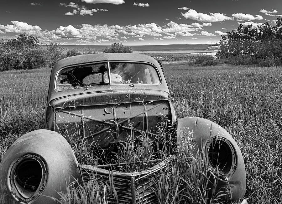 Black And White Photograph - Old Car Out to Pasture by Phil And Karen Rispin