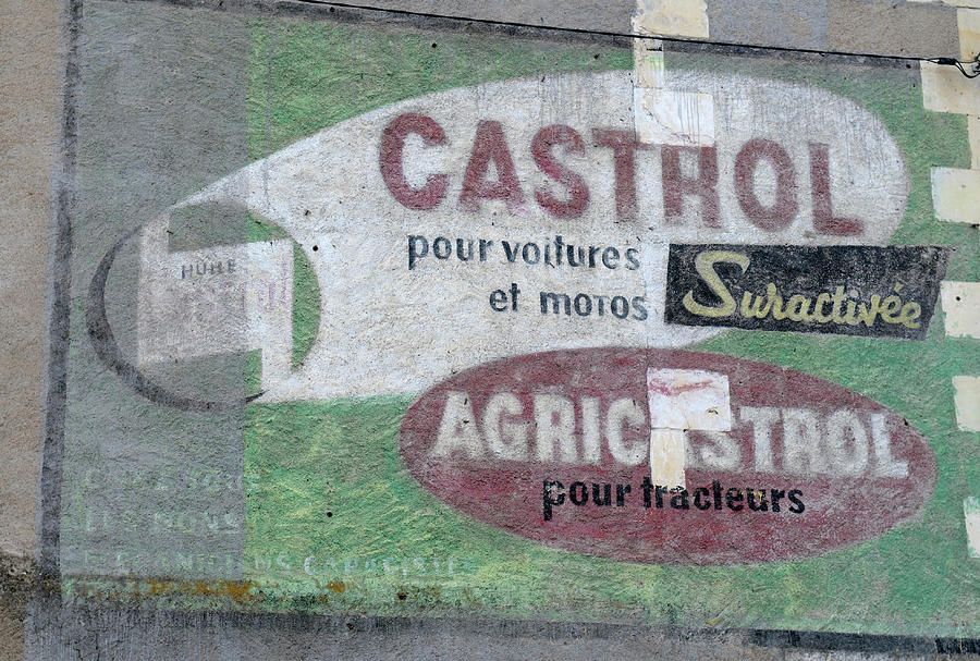 Old Castrol sign painted on a wall, Nevers, Nievre, Burgundy, France Photograph by Kevin Oke
