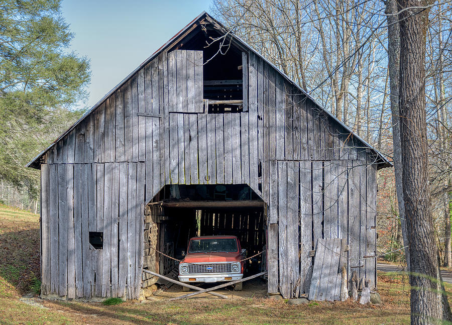 Nature Photograph - Old Chevy truck in a barn by Paul Freidlund