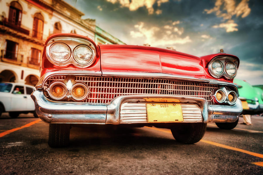 Old classic car in downtown Havana Photograph by Karel Miragaya