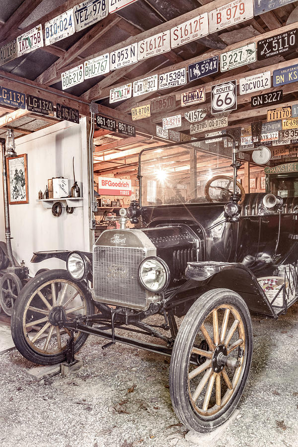 Old Classic in the Country Garage Photograph by Debra and Dave Vanderlaan
