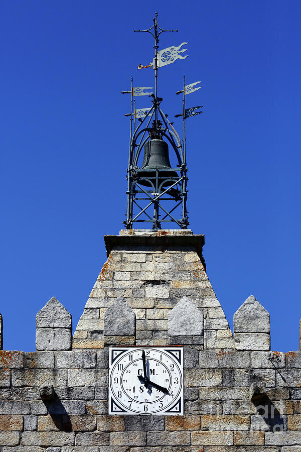 Old Clock Tower close up Caminha Portugal Photograph by James Brunker