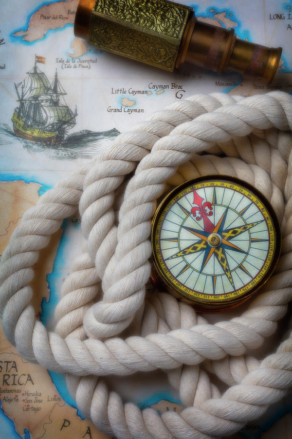 Map Photograph - Old Compass In Rope On Map by Garry Gay