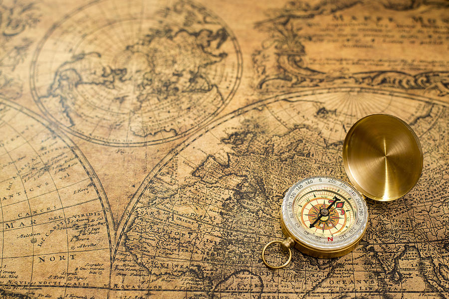 Old Compass  On Vintage Map Photograph by Tonefotografia