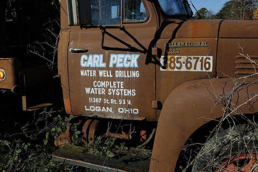 Truck Photograph - Old Drilling Rig by Jeff Roney