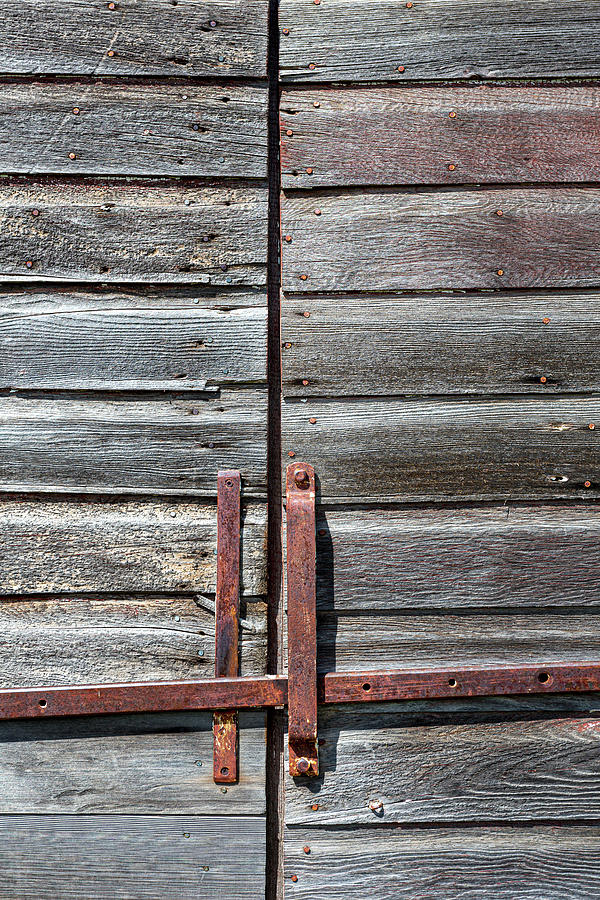 Old farm building door handles Photograph by Lauri Novak