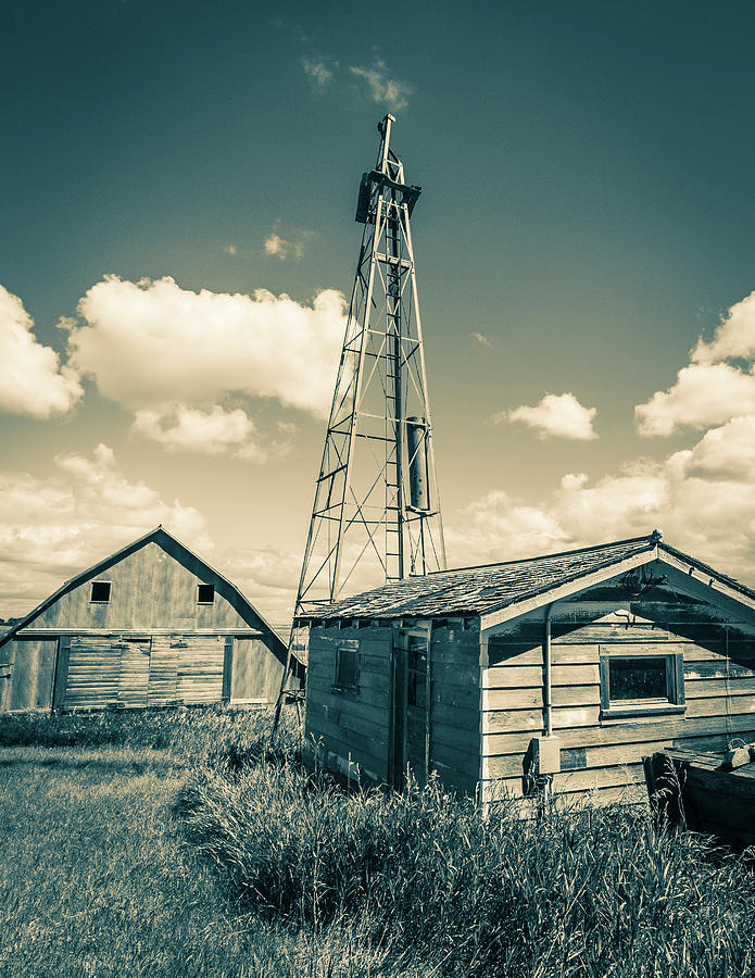 Old farm with windmill in North Dakota Photograph by Lauri Novak