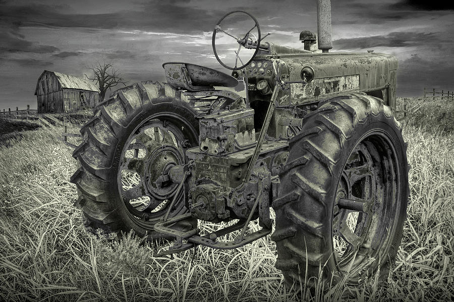 Old Farmall Tractor inBlack and White on a Grassy Field on a Far Photograph by Randall Nyhof