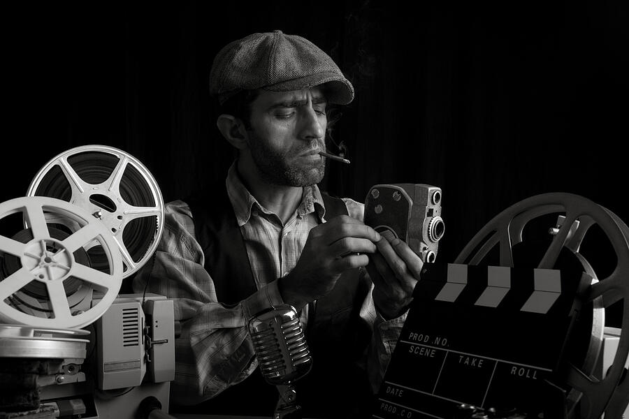 Old Fashioned Cinema Director Posing With Cinema Equipments And Smoking Photograph by Selimaksan