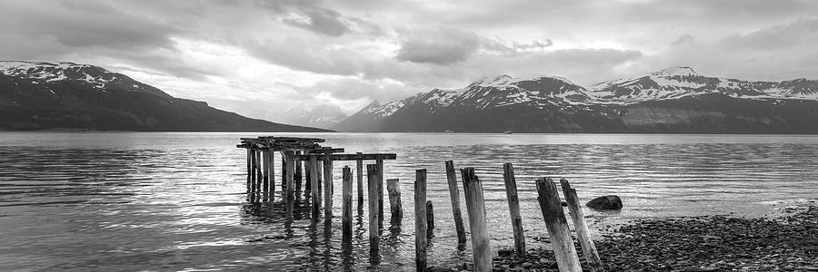 Old fishing Pier Ullsfjorden Fjord Lyngen Alps Black and white T Photograph by Sonny Ryse