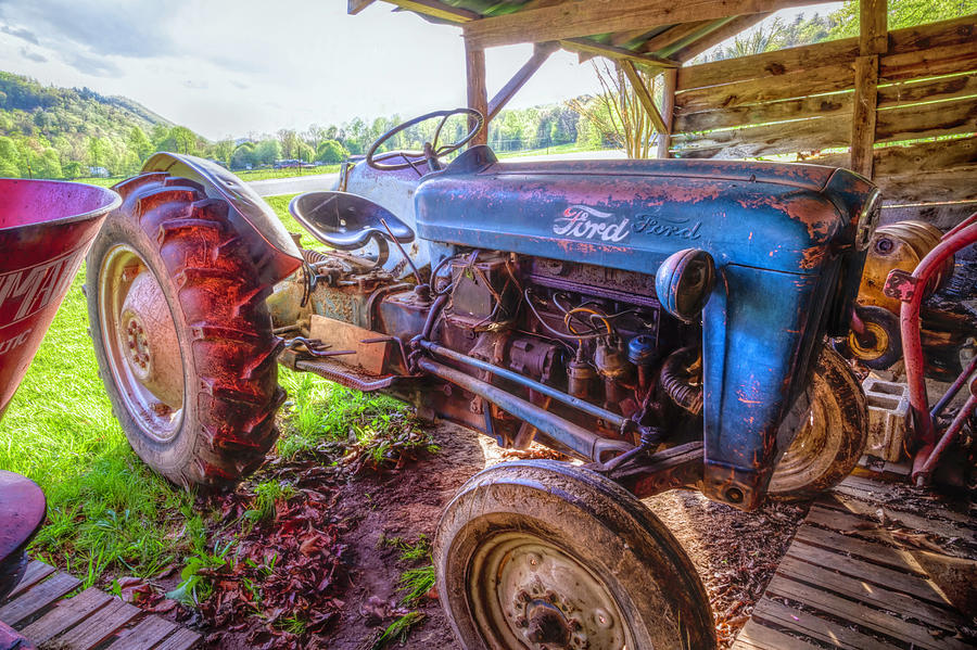 Old Ford Tractor in the Barn Photograph by Debra and Dave Vanderlaan