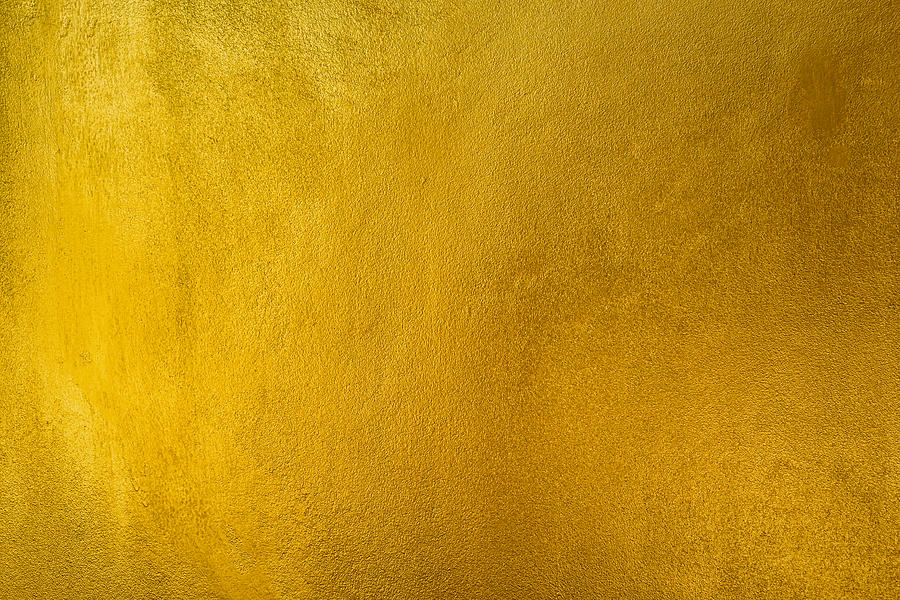 Old grunge golden wall, Yellow texture background. Photograph by Pakin Songmor
