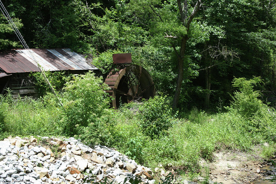 Pebbles Photograph - Old Iron Waterwheel by Cathy Harper