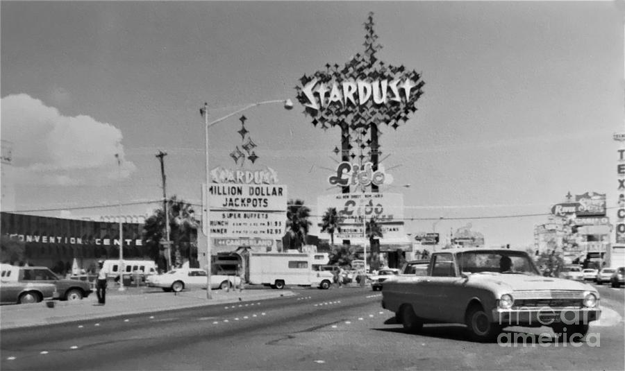 Old Las Vegas Strip BW Stardust Hotel Casino Classic Cars Scene Las Vegas Blvd 1984 Photograph by John Shiron