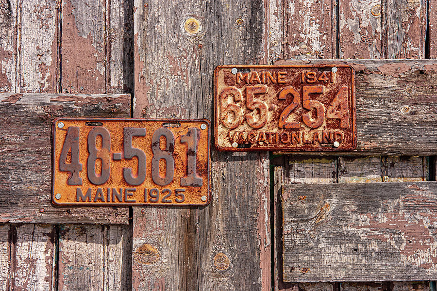 Old license plates from Maine. Photograph by Barry Tarr - Pixels