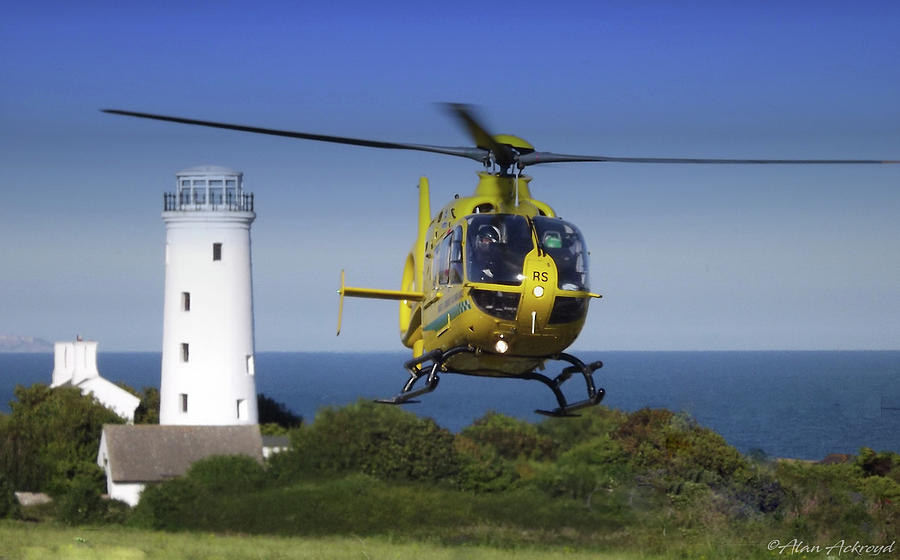 Old Lighthouse and Helicopter Photograph by Alan Ackroyd