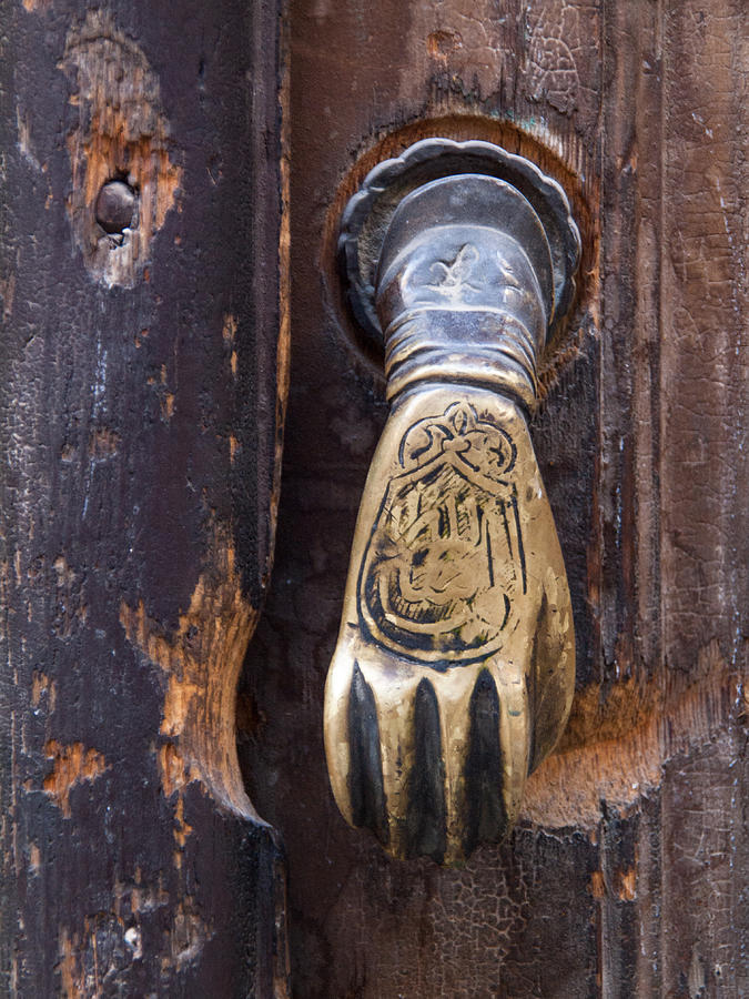Old metallic door knob shaped as Hand of Fatima. Damascus, Syria Photograph by Evgenii Zotov