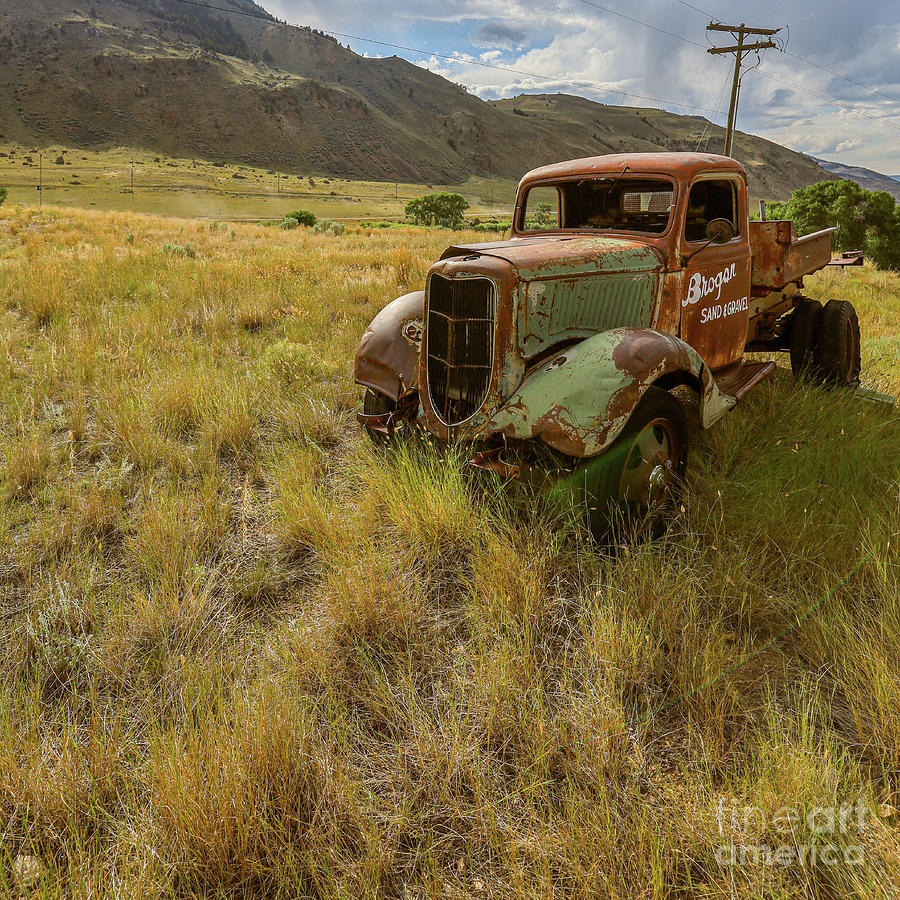 Yellowstone National Park Photograph - Old Mining Truck Square Outside Yellowstone by Edward Fielding