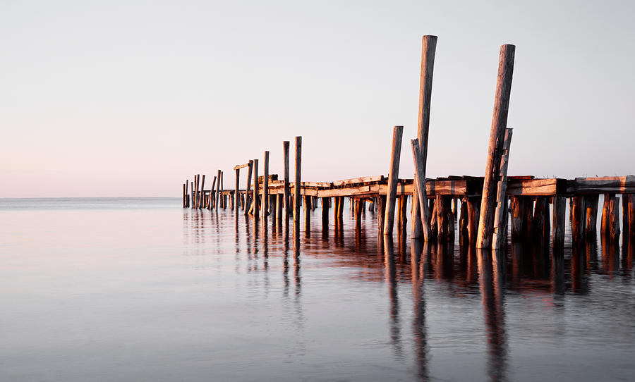 Old pier Photograph by Image Source
