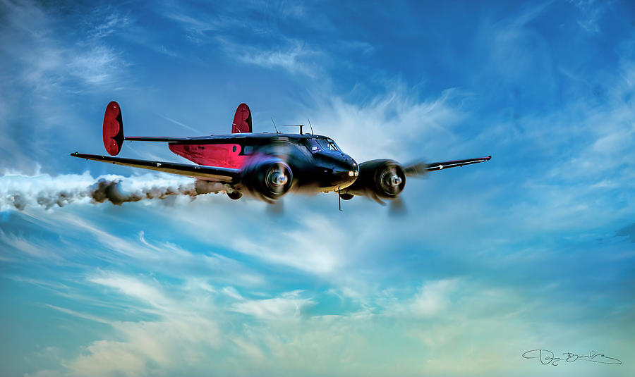 Old Plane With White Clouds And Blue Sky Photograph by Dan Barba