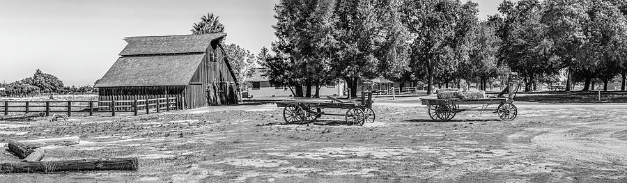 Old Red Barn and Hay Wagons - Black And White Photograph by Gene Parks