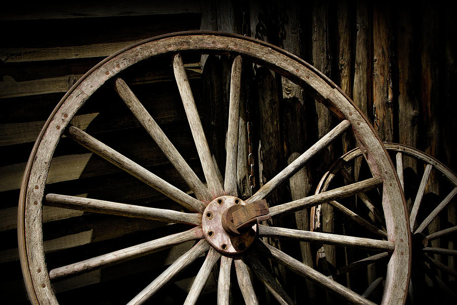 Old Rustic Wooden Wagon Wheel  Photograph by Randall Nyhof