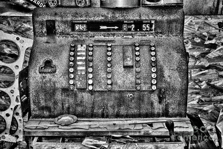 Black And White Photograph - Old rusty cash register in black and white by Paul Ward