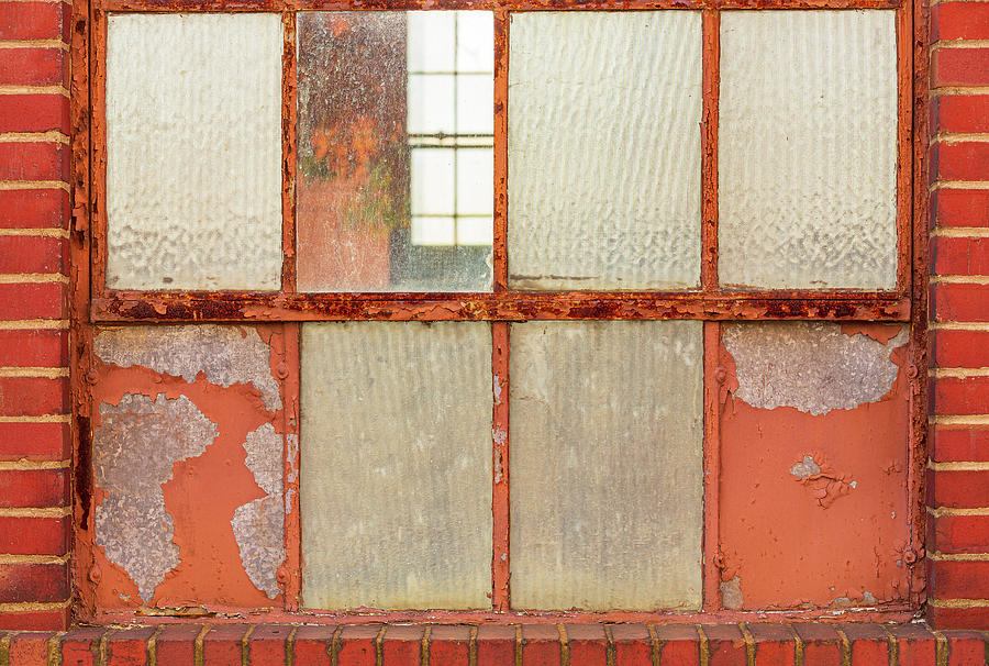 Old Rusty Window In Warehouse Painted Red And Orange Photograph