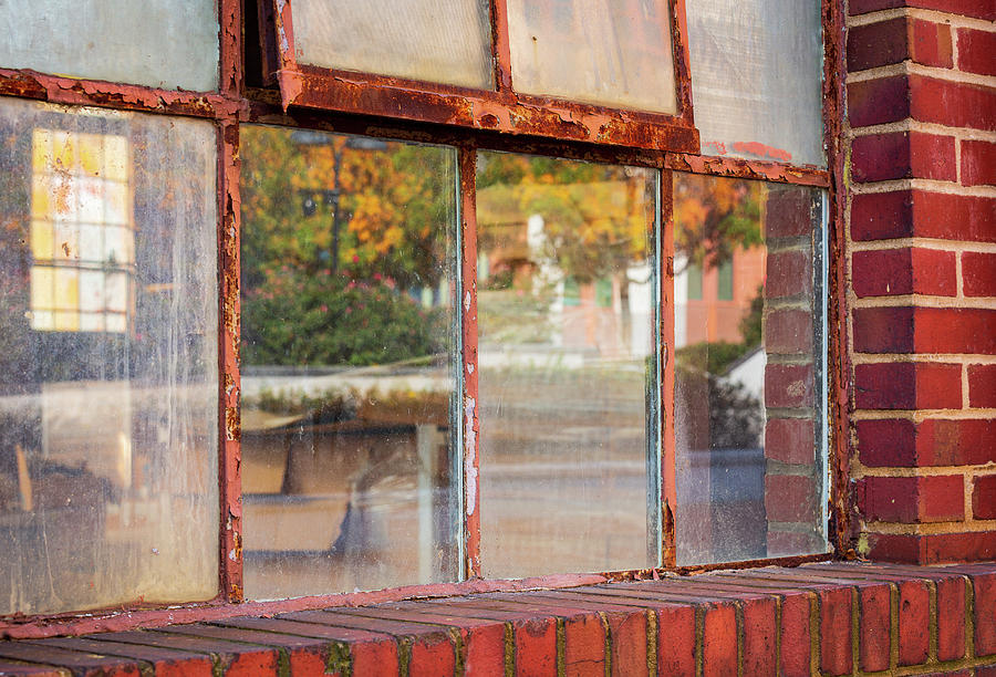 Old Rusty Window In Warehouse Reflecting Autumn Photograph