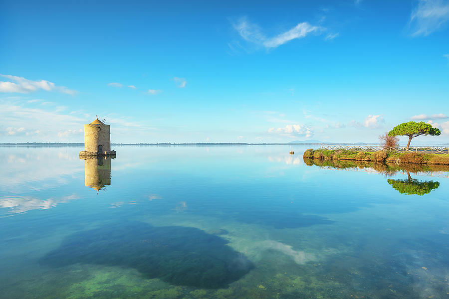 Old spanish windmill in Orbetello lagoon, Argentario, Italy. Photograph by Stefano Orazzini