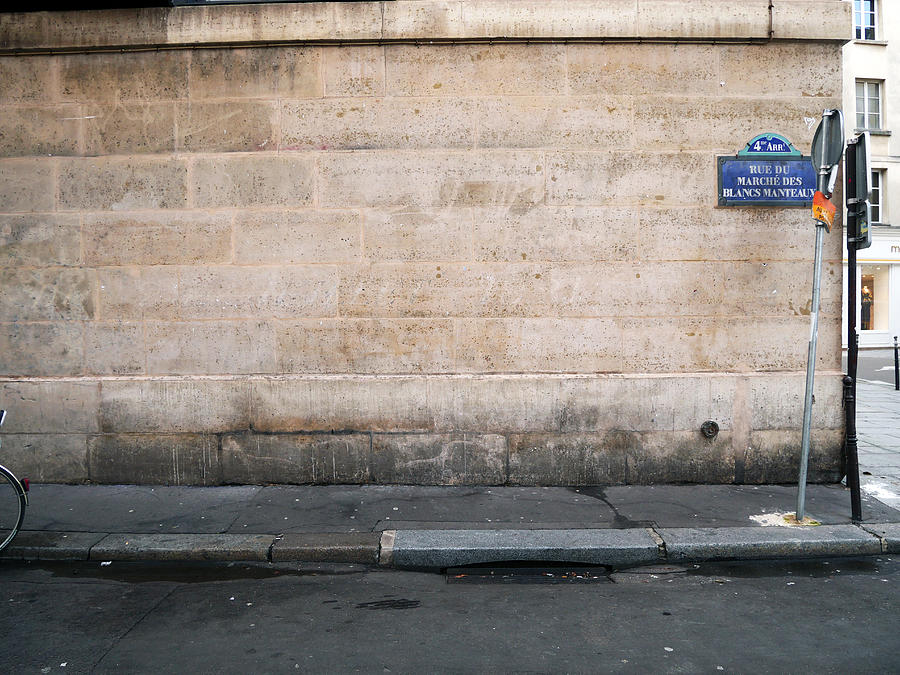 Old stone wall and street in the Marais in Paris Photograph by Colors Hunter - Chasseur de Couleurs