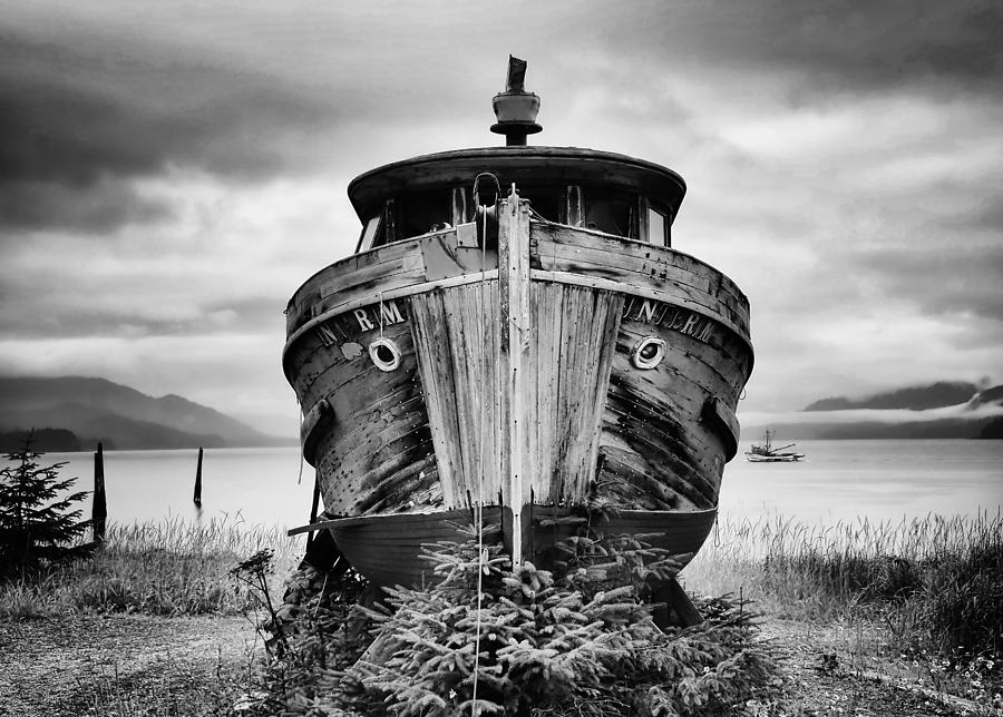 Black And White Photograph - Old Timber Boat Alaska by Peter Cole