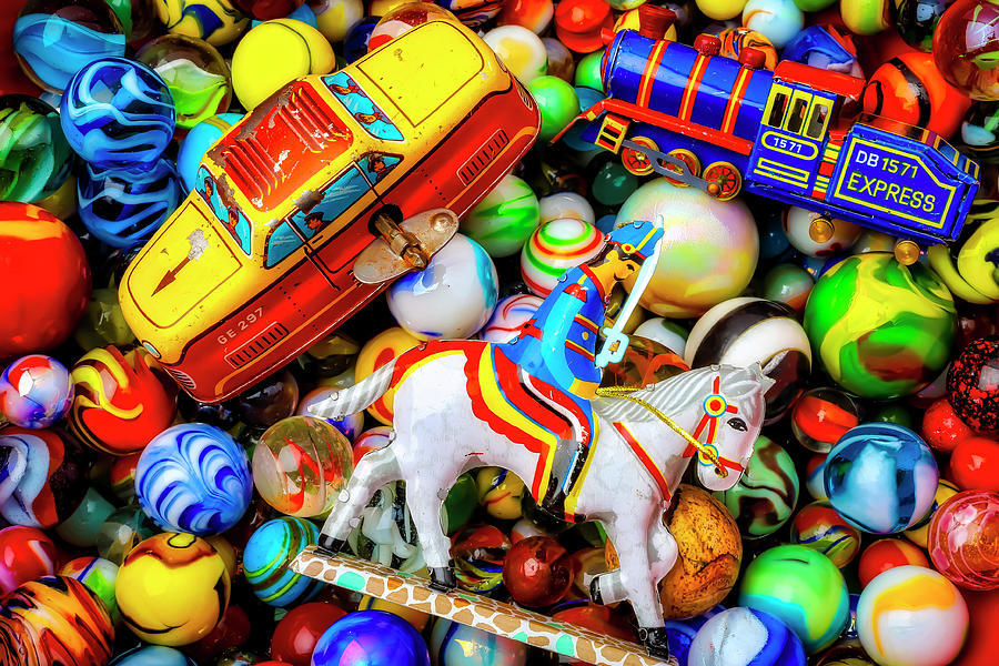 Old Tin Toys And Marbles Photograph by Garry Gay