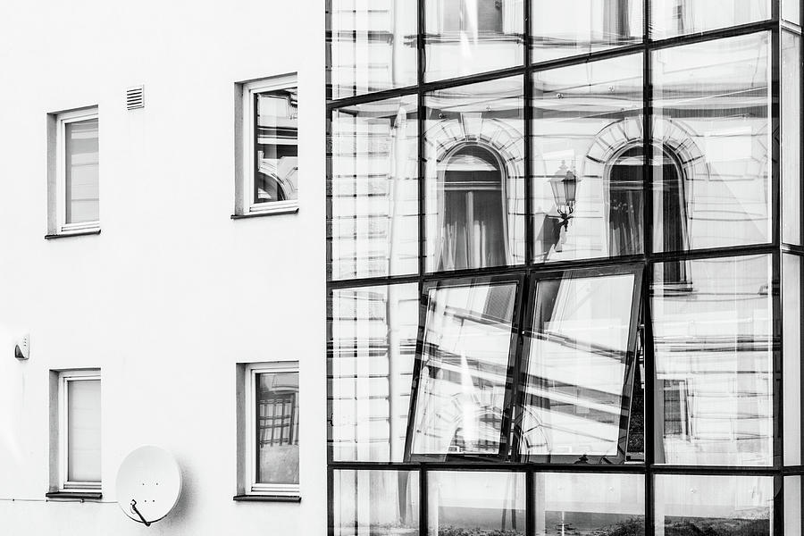 Old town hall reflected in modern glass wall Photograph by Viktor Wallon-Hars