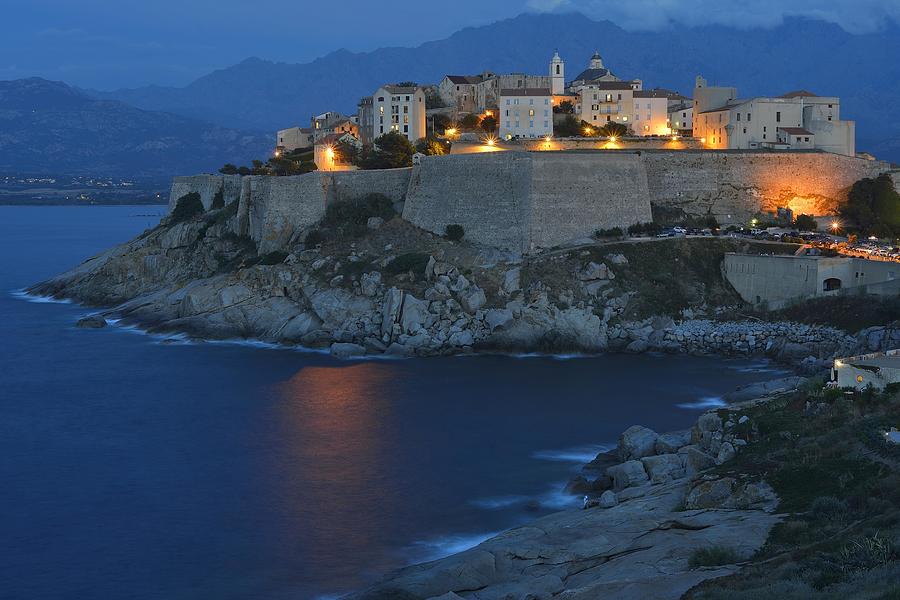 Old town with citadel at dusk, Calvi, Haute-Corse, Corsica, France Photograph by Peter Giovannini
