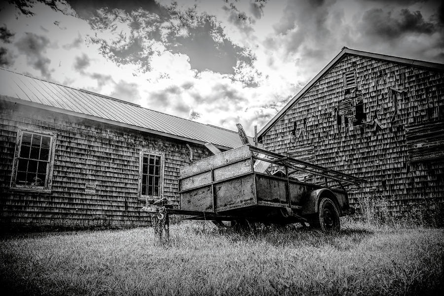 Black And White Photograph - Old Trailer at Camp Picton, Ontario by John Twynam