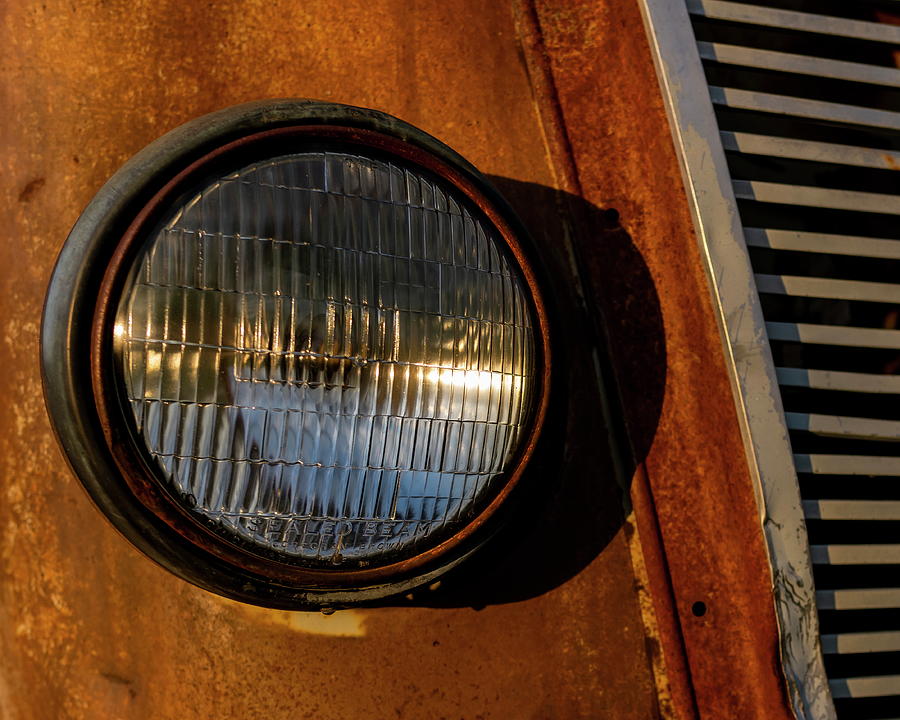 Old Truck headlight and grill Photograph by Art Whitton