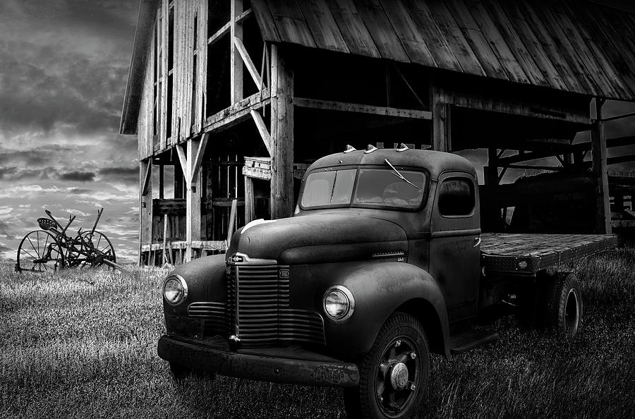 Old Truck Relic with Barn Skeleton on a Abandoned Farm in Black  Photograph by Randall Nyhof