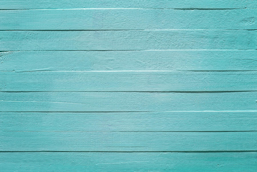 Old turquoise wooden panel background. Photograph by Enviromantic