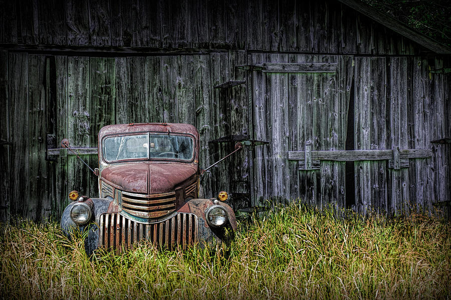 Old Vintage Chevy Truck abandoned by a Rural Barn Photograph by Randall Nyhof