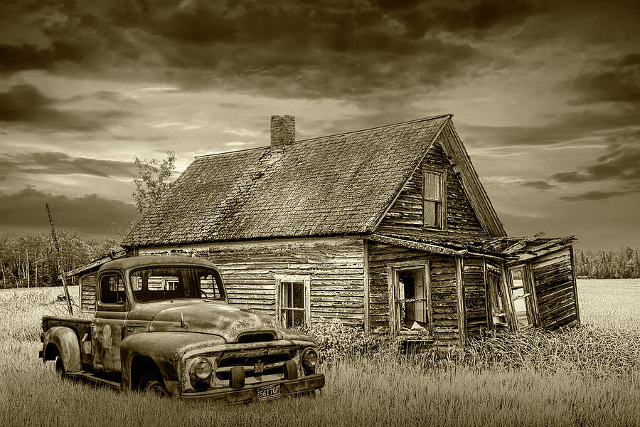 Old Vintage Pickup Truck by an Abandoned House at Sunset in Sepi Photograph by Randall Nyhof