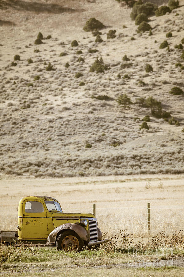 Old Vintage Ranch Truck Clyde Park Montana Photograph by Edward Fielding