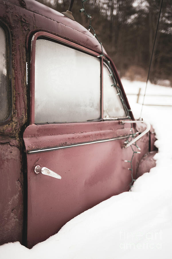 Old Vintage Red Car in a Snow Bank Photograph by Edward Fielding