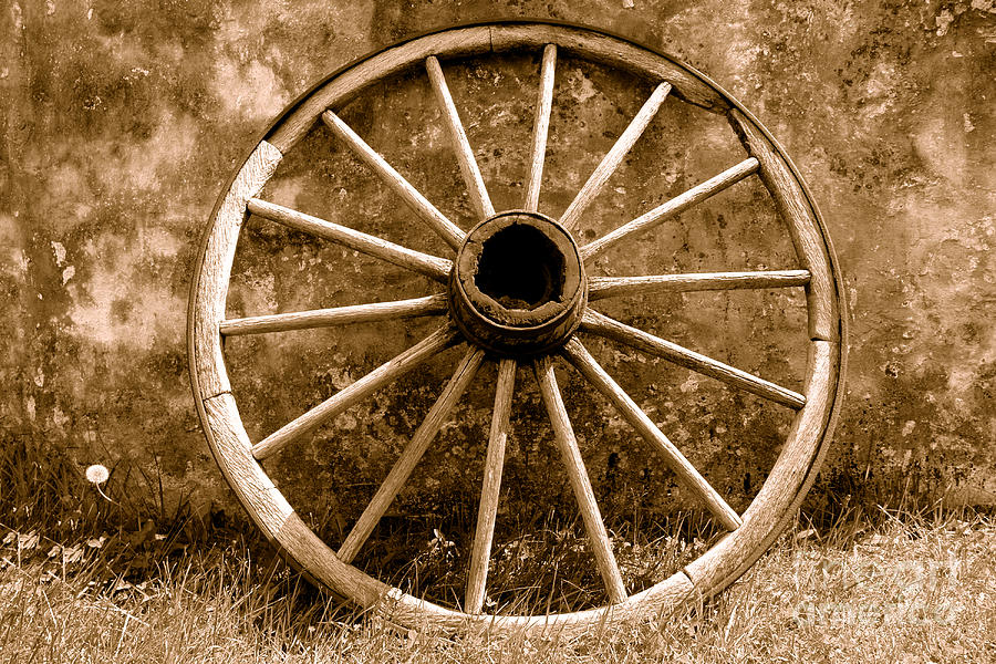 Wagon Photograph - Old Wagon Wheel - Sepia by Olivier Le Queinec