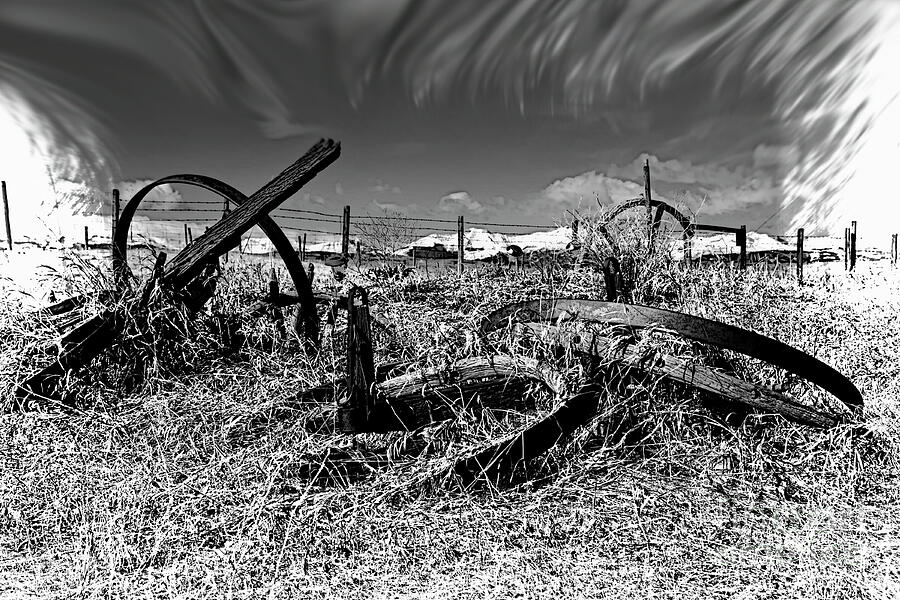 Old Wagon Wheels and The Rockies Photograph by Al Bourassa